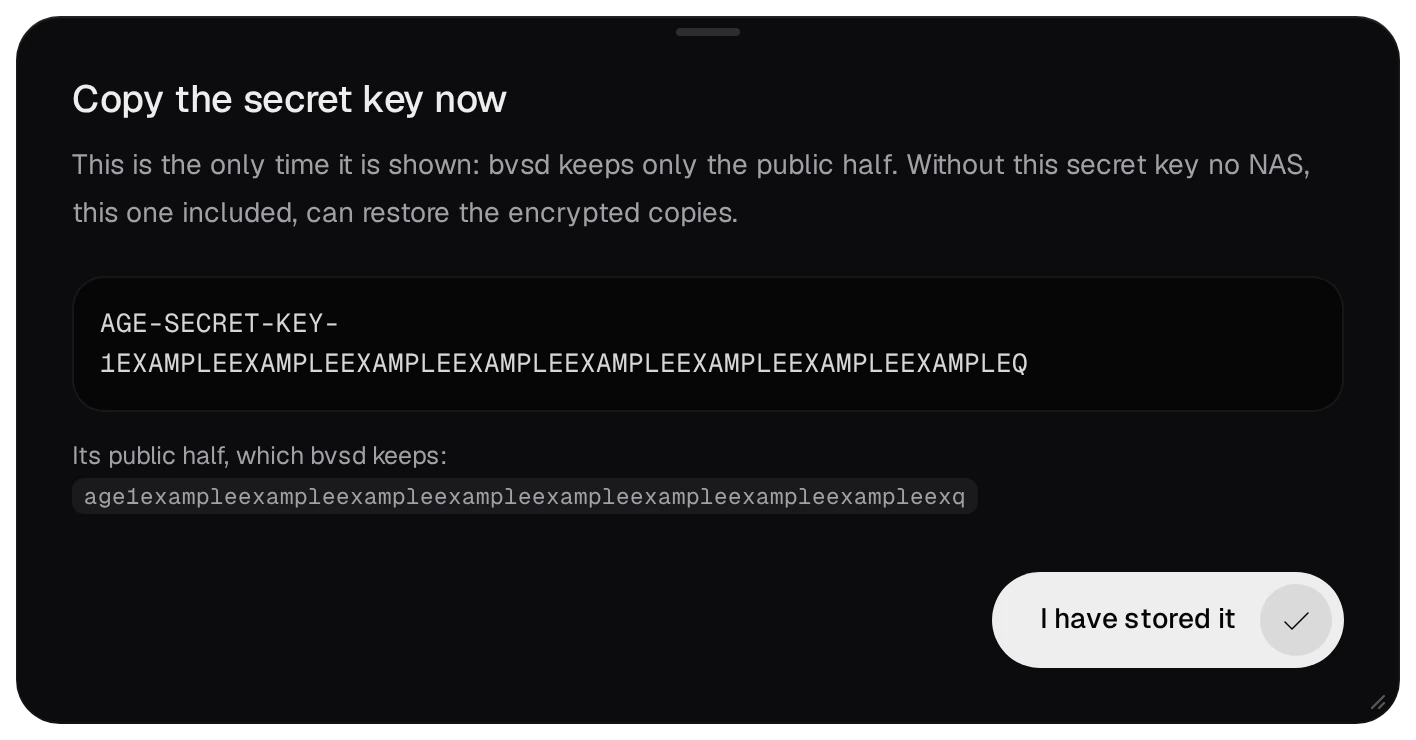 Copy the secret key now: a sample AGE-SECRET-KEY, its public half, and the I have stored it button